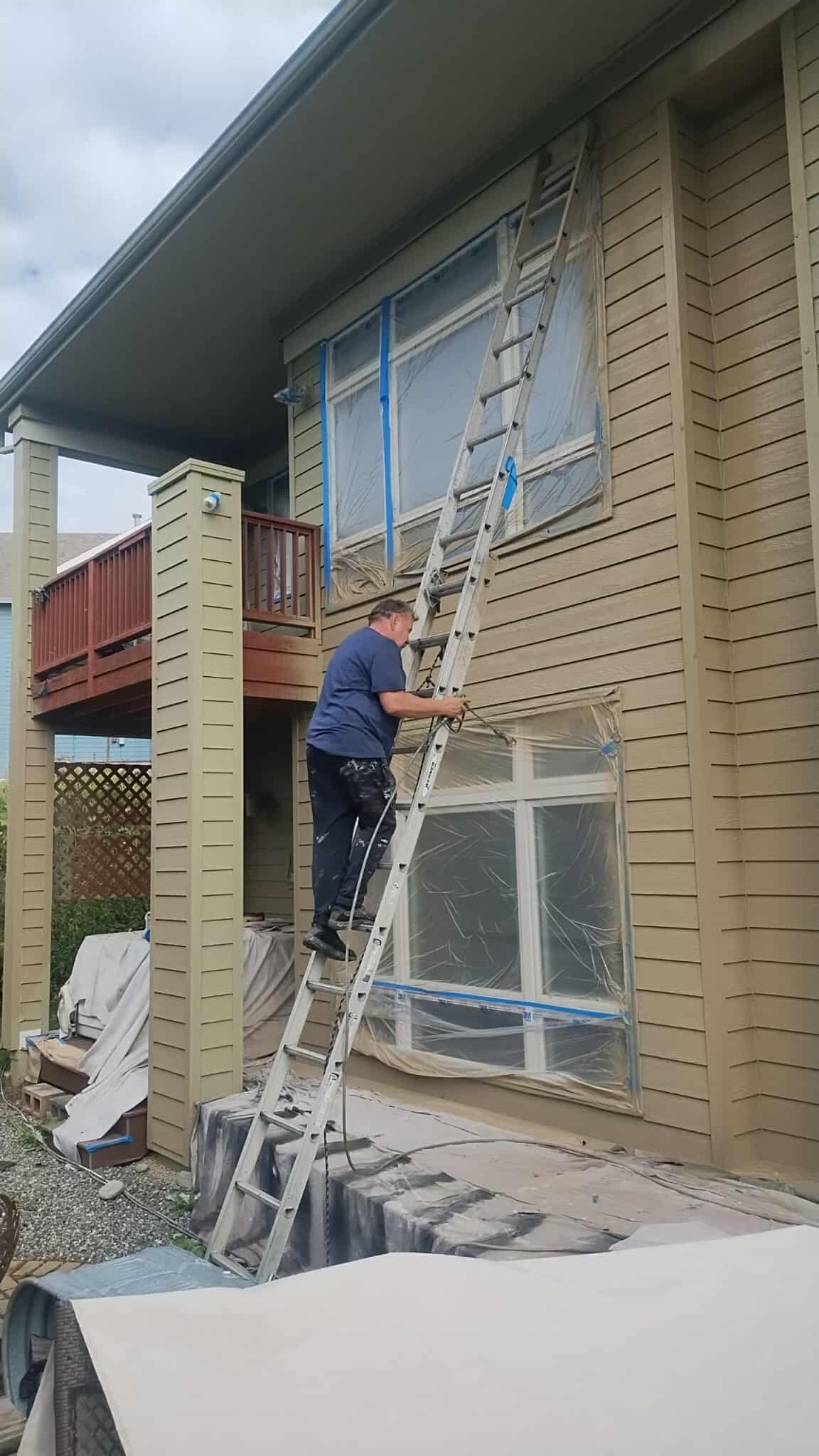 Pressure washing before exterior painting
